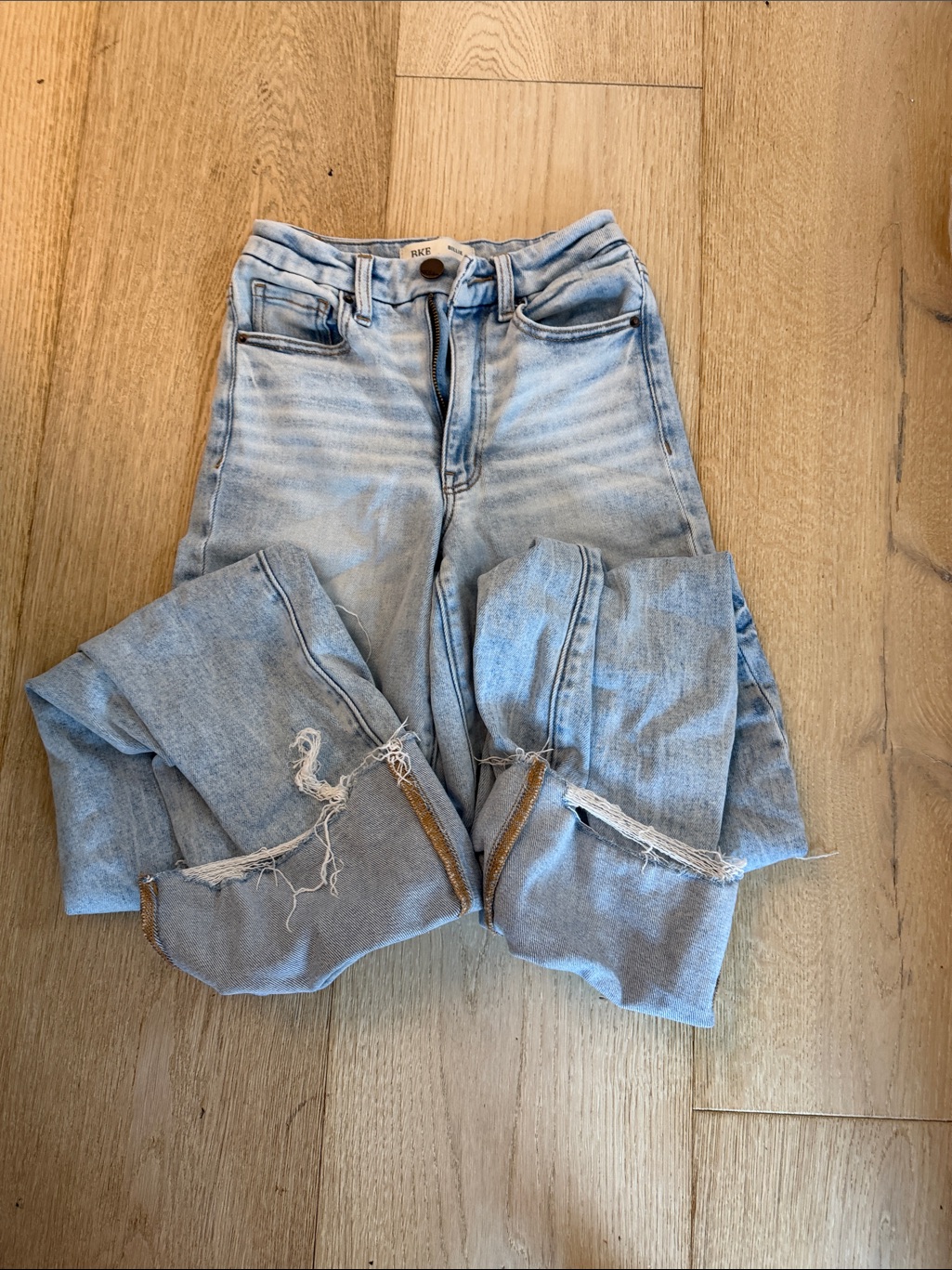 Buckle Light Blue High-Rise Distressed Jeans